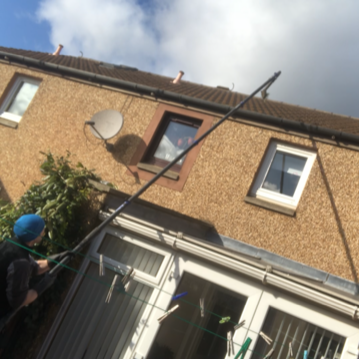 reaching gutters over a conservatory